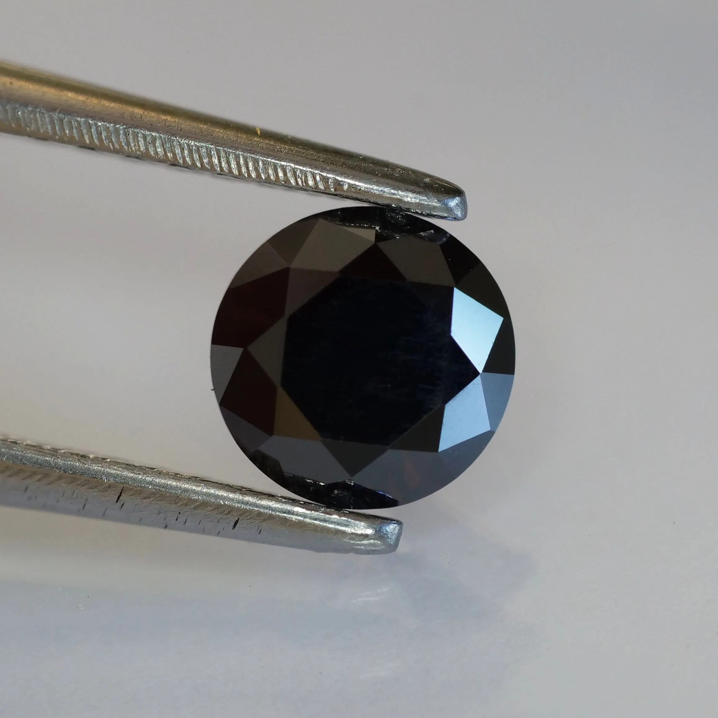 Moissanite | round cut 5mm, Black color, VS, 0.5 ct